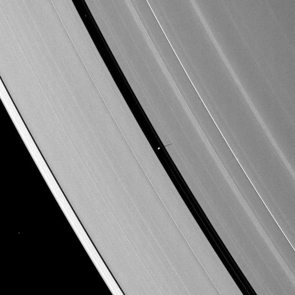 Small shadow over the rings of Saturn