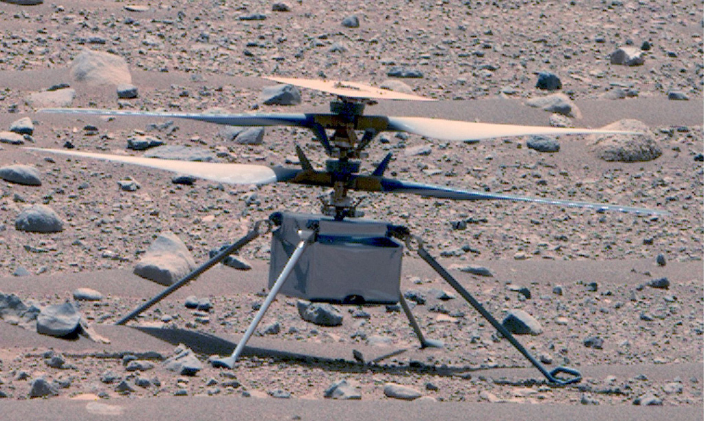 image of the full rotorcraft on the rocky surface of Mars