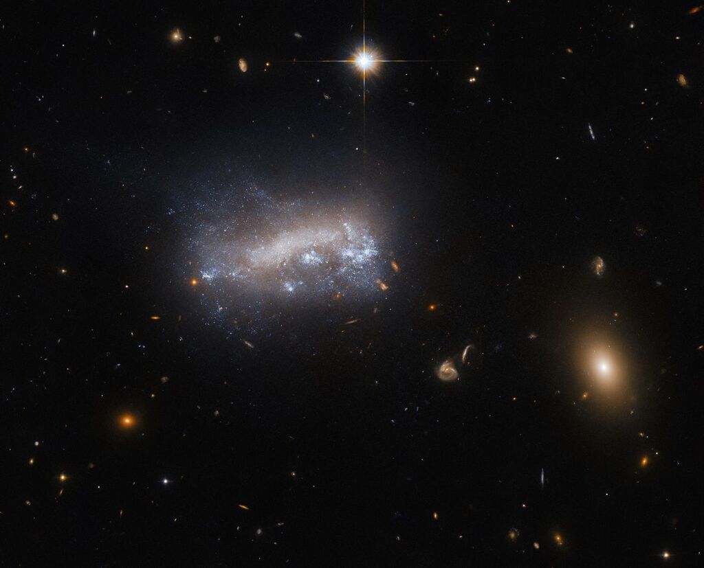 images of different types of galaxies against the darkness of space