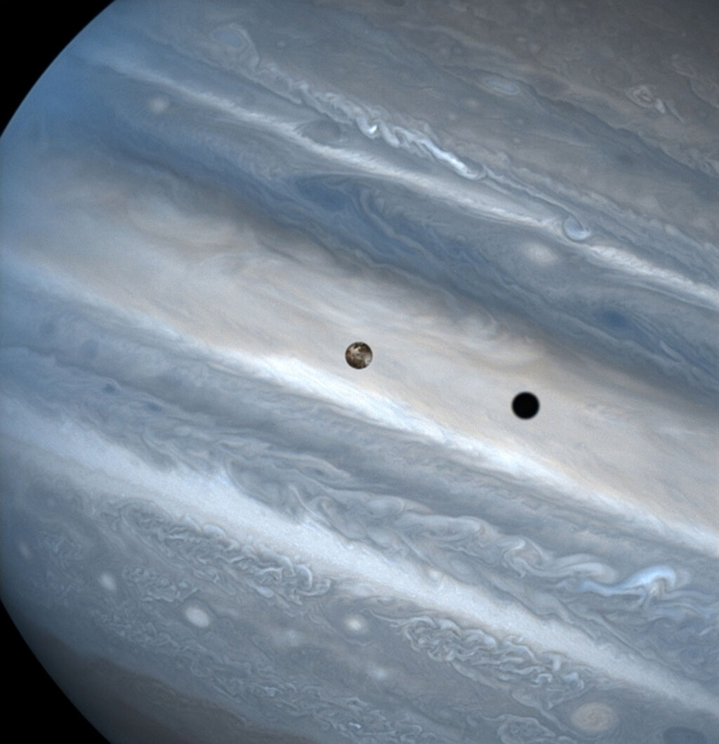 black spot on the surface of Jupiter - Io's shadow
