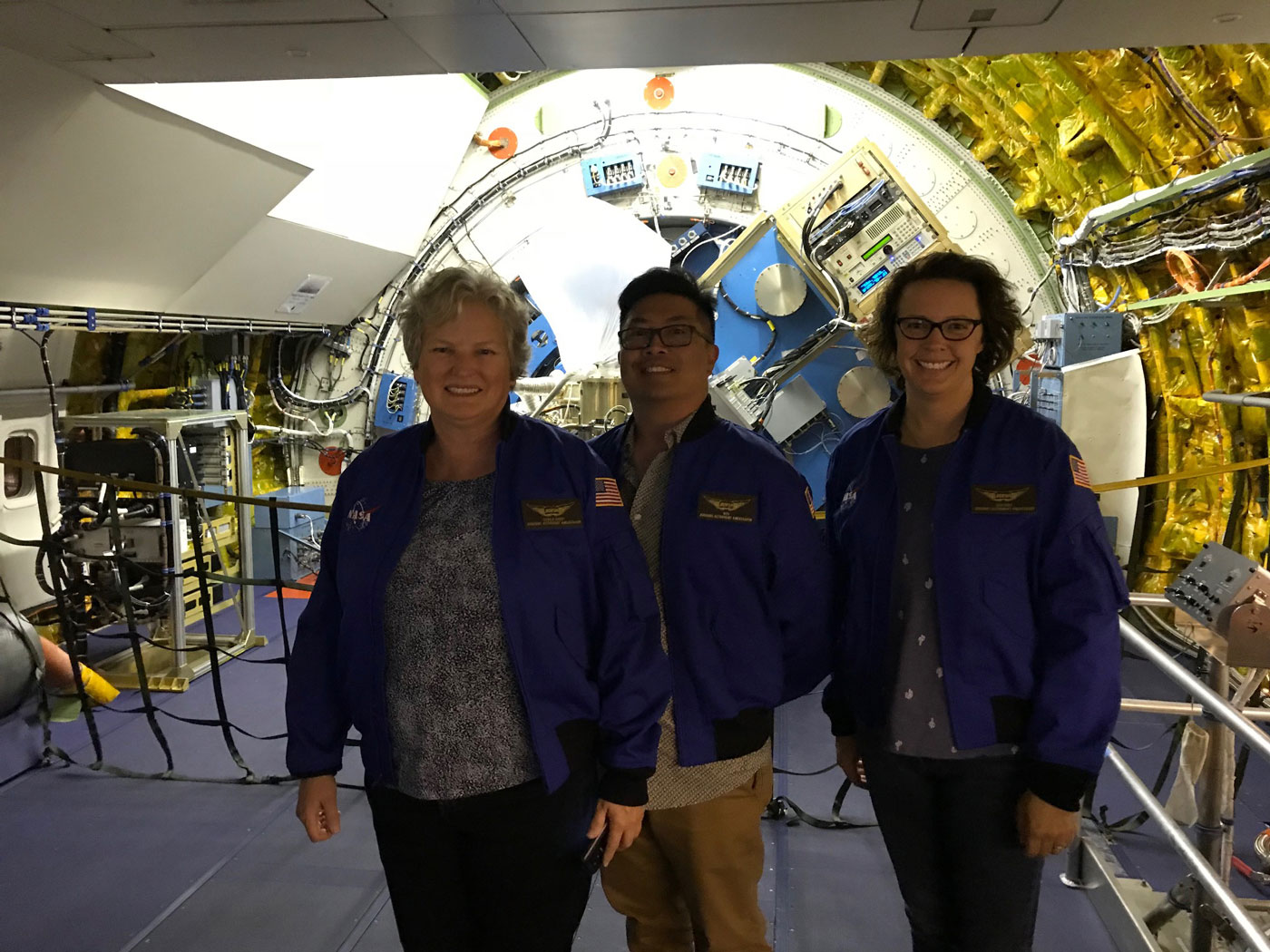 AAA teachers in front of telescope