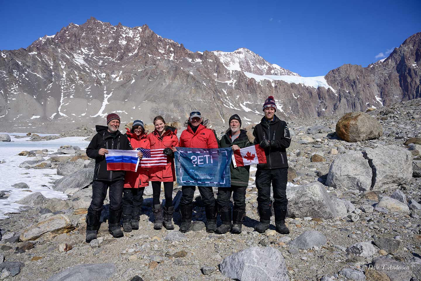 Dale Andersen and team with SETI Institute expedition flag