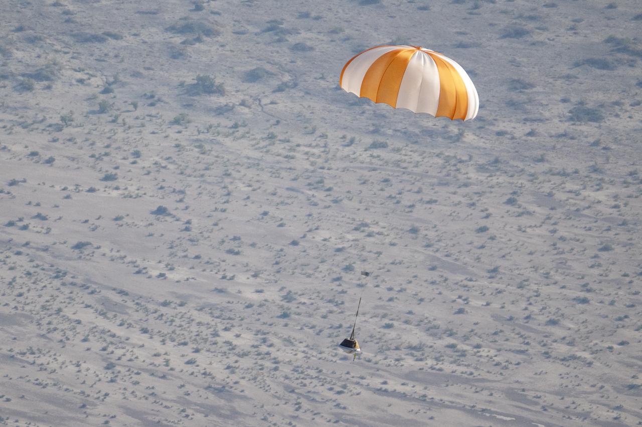 OSIRIS-REx Sample Return training showing the sample landing safely with a parachute