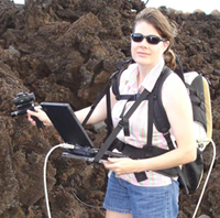 Dr. Bishop measuring spectra of lava rocks on Maui.