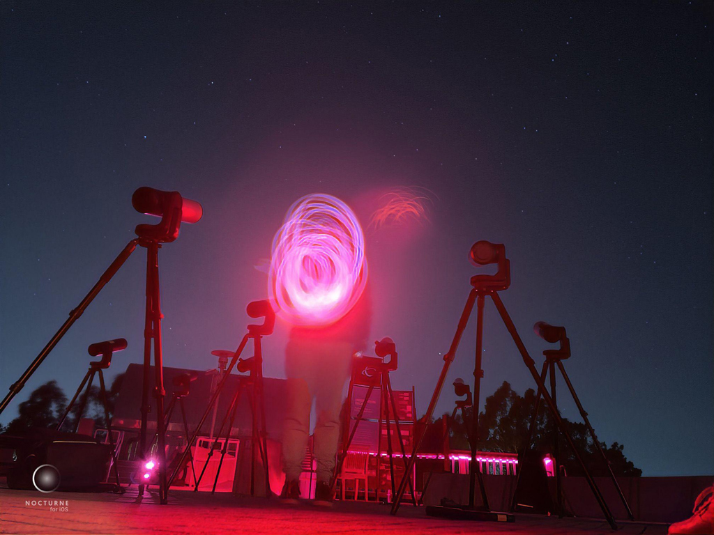 image of a person painting with light using Unistellar's Nocturne app