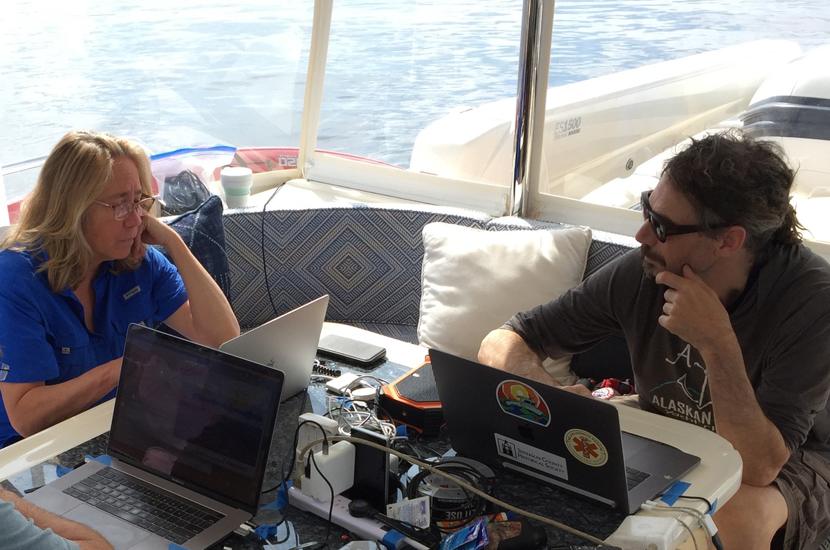 Dr. Brenda McCowan and Dr. Fred Sharpe at work onboard the Blue Pearl.  Image credit: Jodi Frediani.