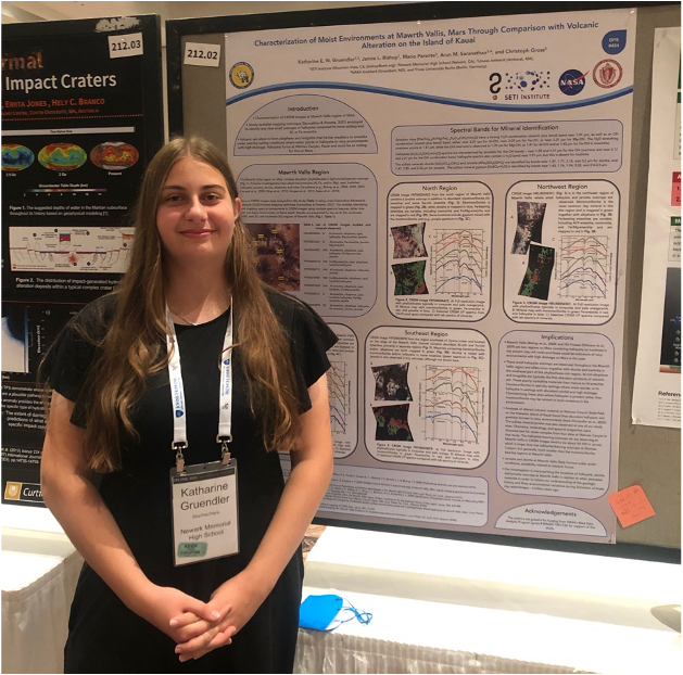Katie presenting her poster on identifying different environments on Mars using orbital spectra from CRISM.