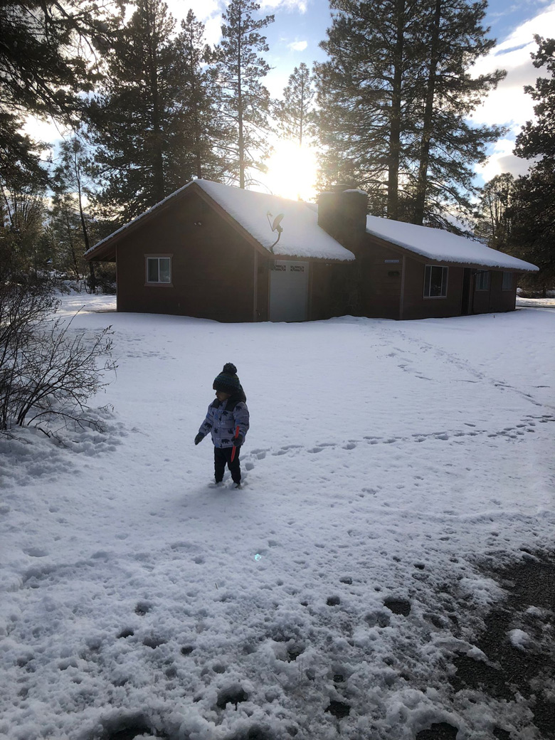 Vishal's 2 year old leaving snow footprints from the house.