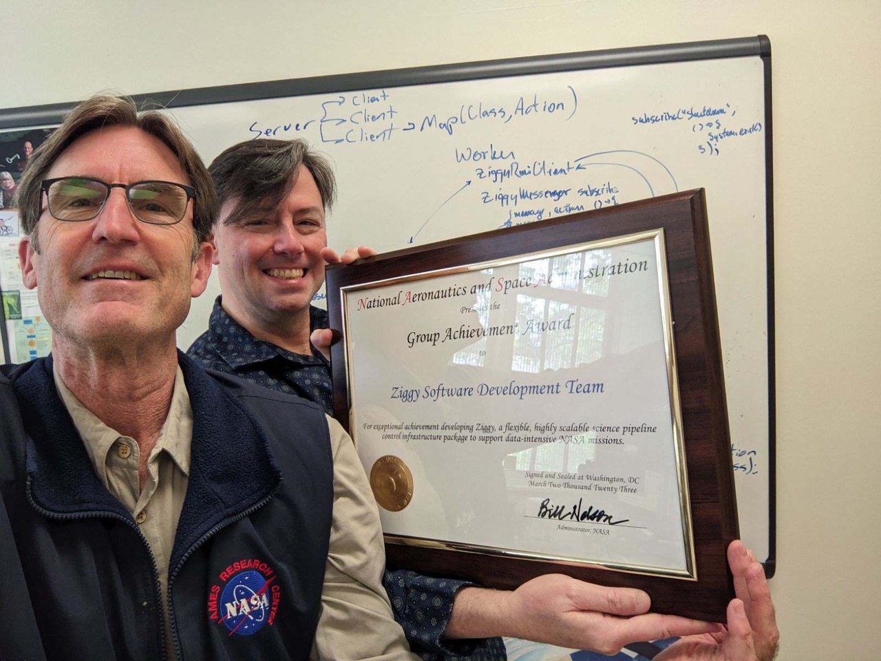 SETI Institute team members Peter Tenenbaum and Bill Wohler with the Award