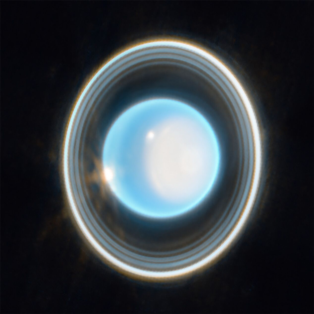 Close up image of the blue ringed planet
