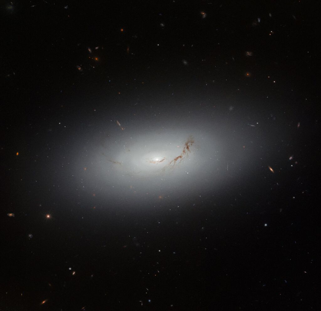 Image of a bright "cloudy" galaxy against a black background