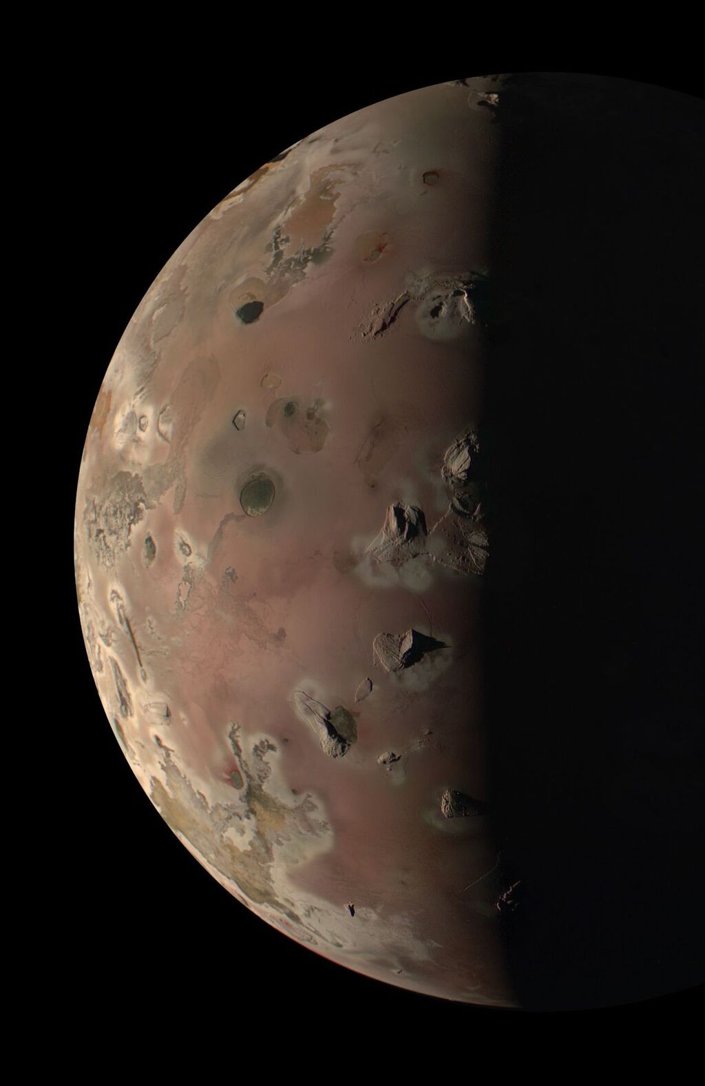 close up image of the reddish-brown moon Io