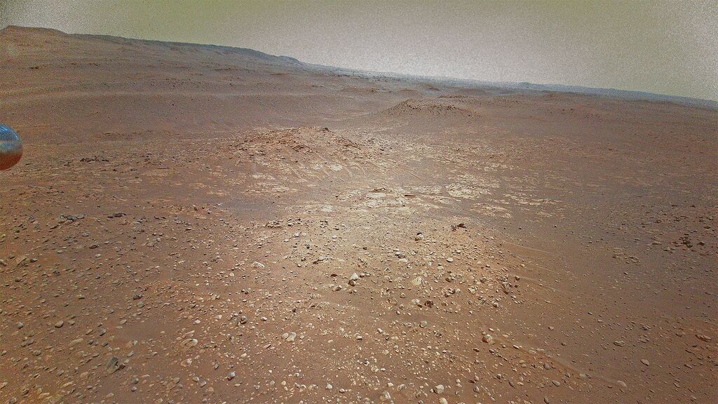 Red and beige rocky surface of Mars through the eyes of ingenuity 