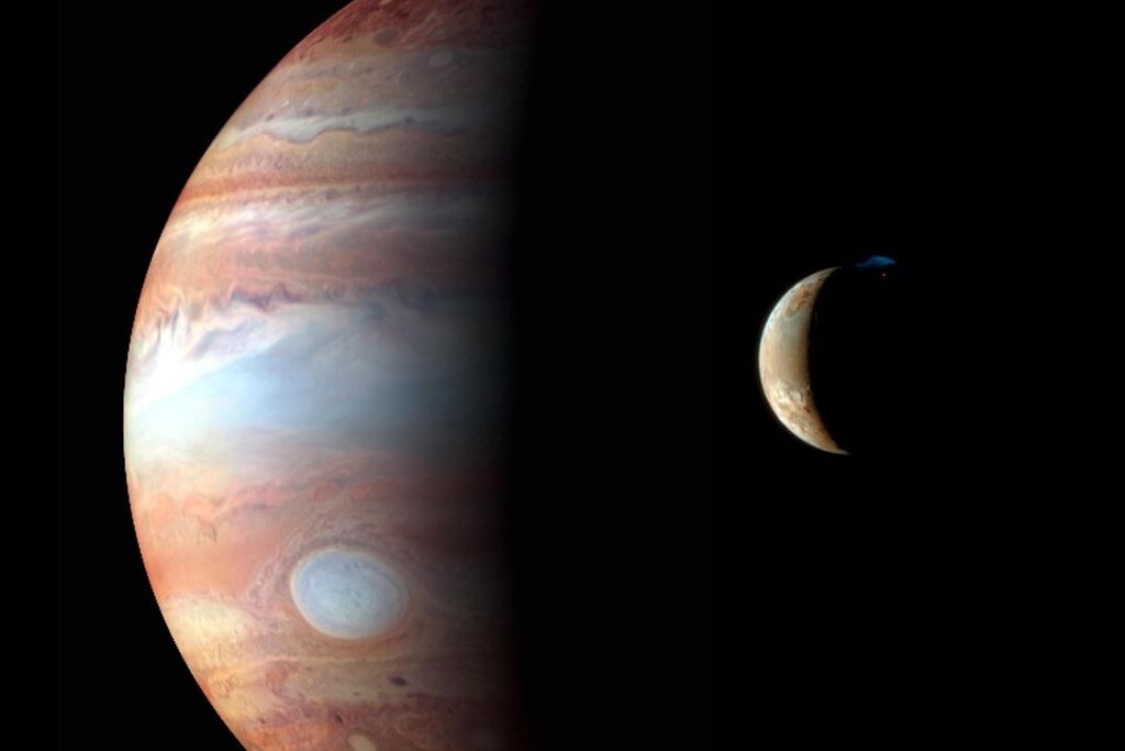 Image of Jupiter alongside its tiny moon Io