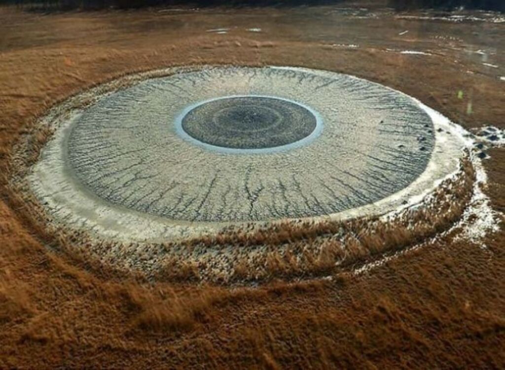 top of the volcano looks like a blue eye watching the sky