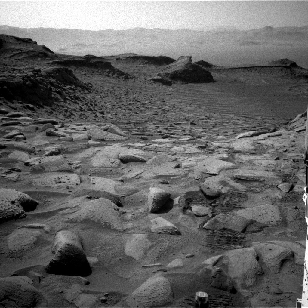 black and white image of the rocky surface/terrain on Mars