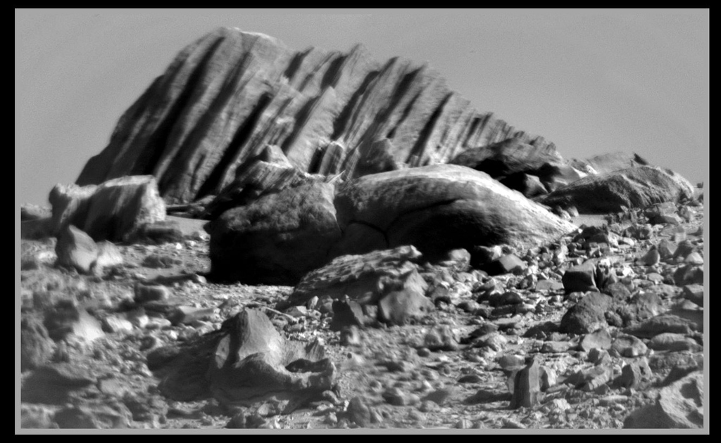Black and white image of the rocks on the surface of mars