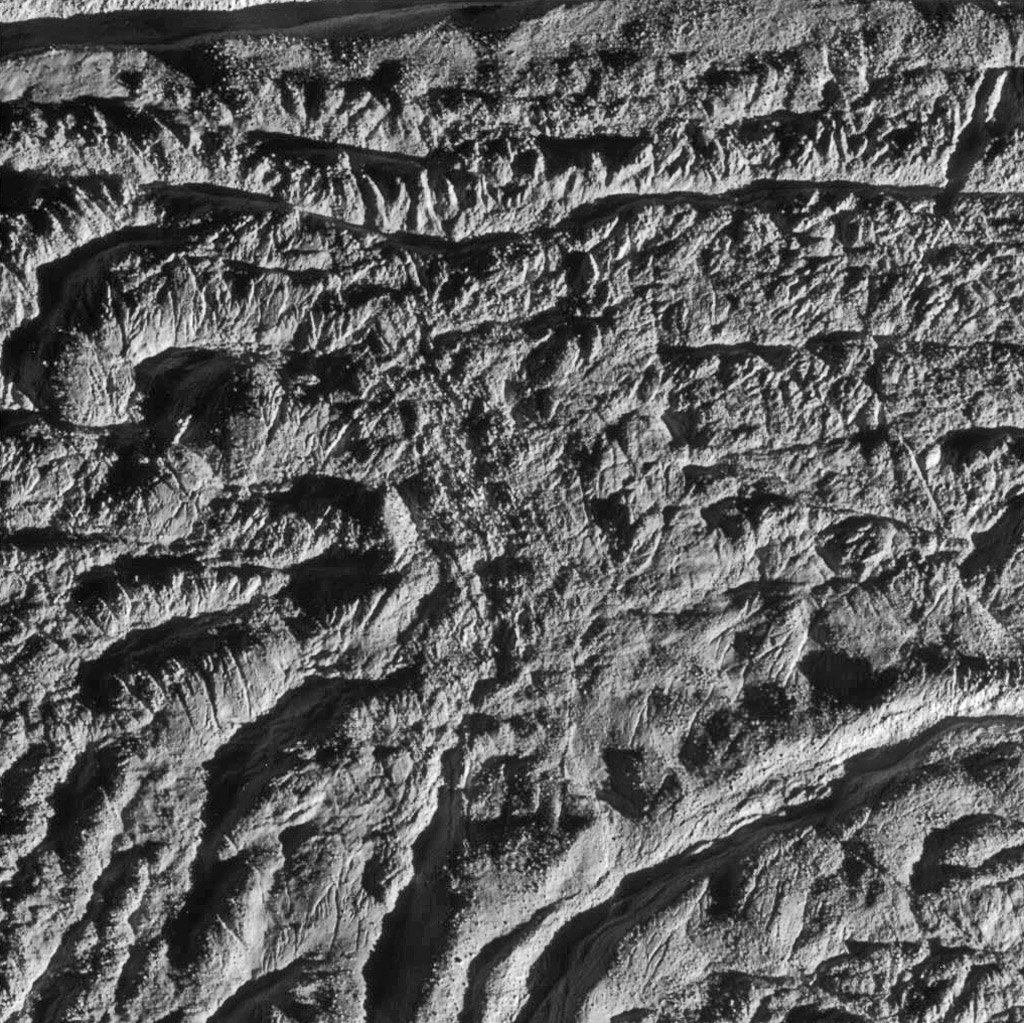 close-up image of Enceladus' rocky gray surface