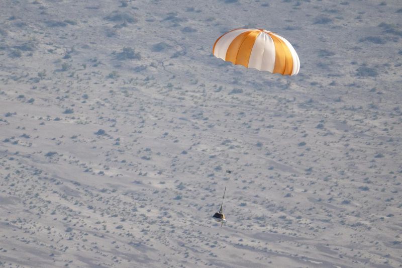 OSIRIS-REx Sample Return training showing the sample landing safely with a parachute
