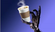 Image of a robotic hand holding a hot cup of coffee