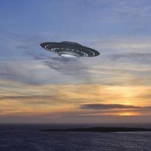 image of a flying saucer over the water