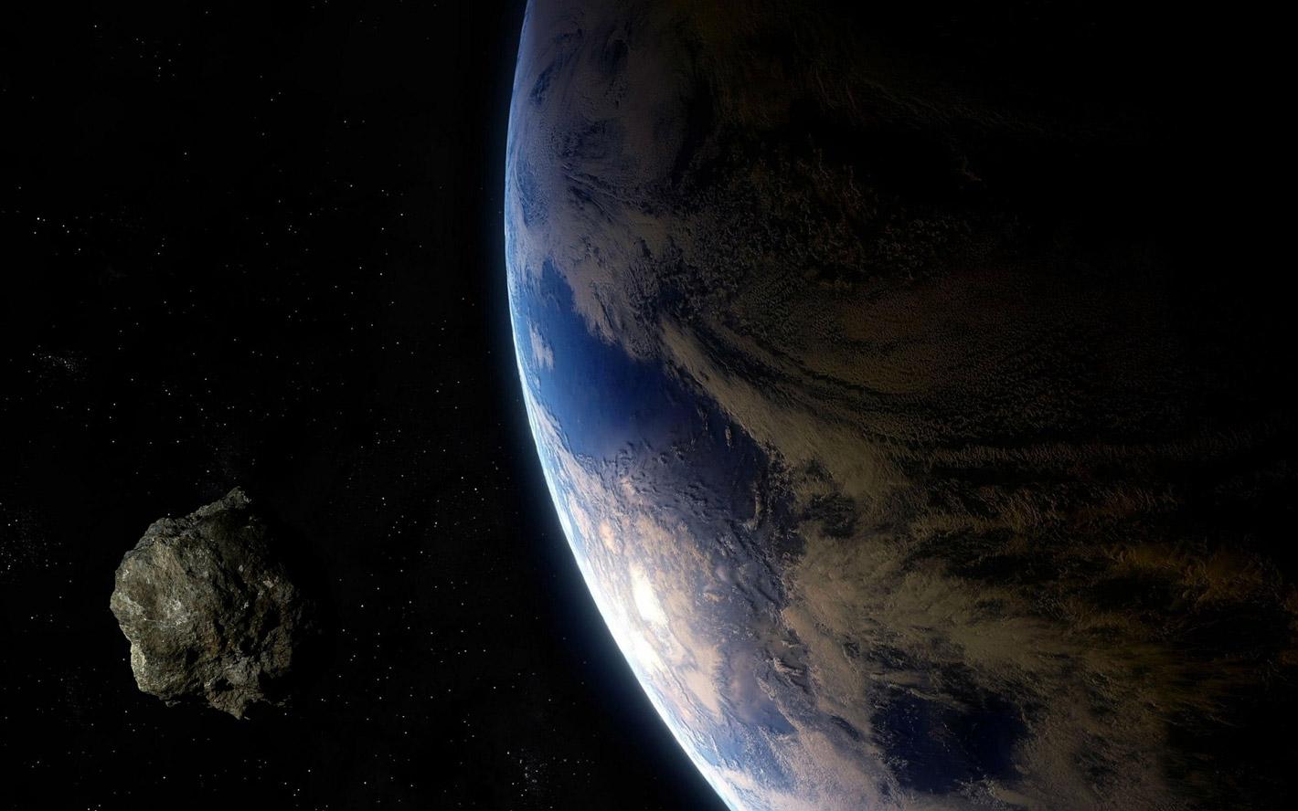 Illustration of an asteroid flying by Earth