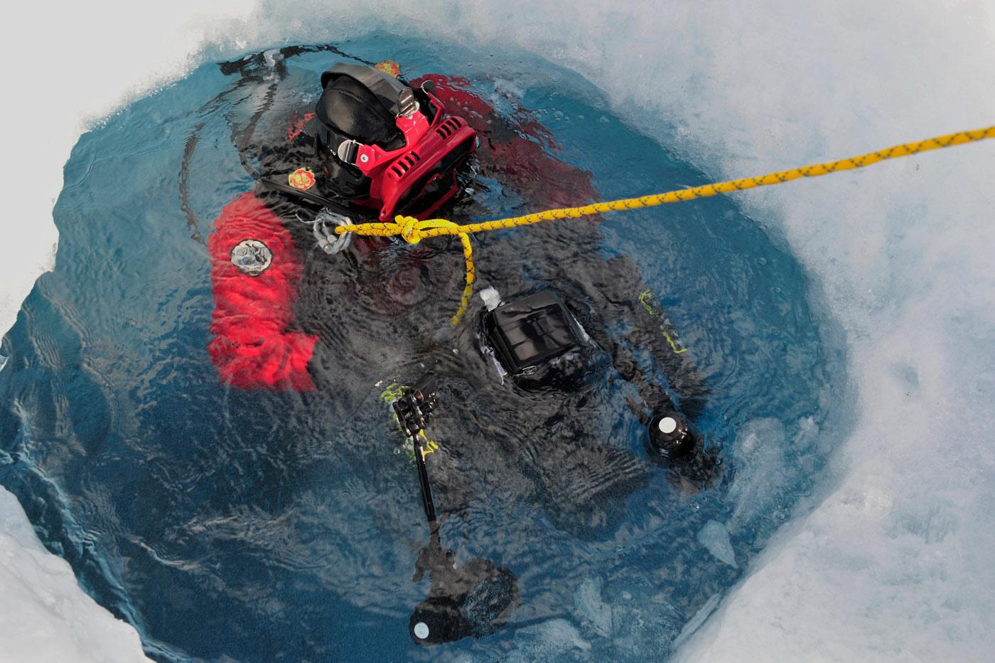 Dale Andersen going into the icy water in Antarctica