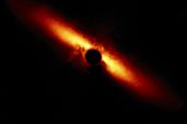 Circumstellar disk around star HD 129590